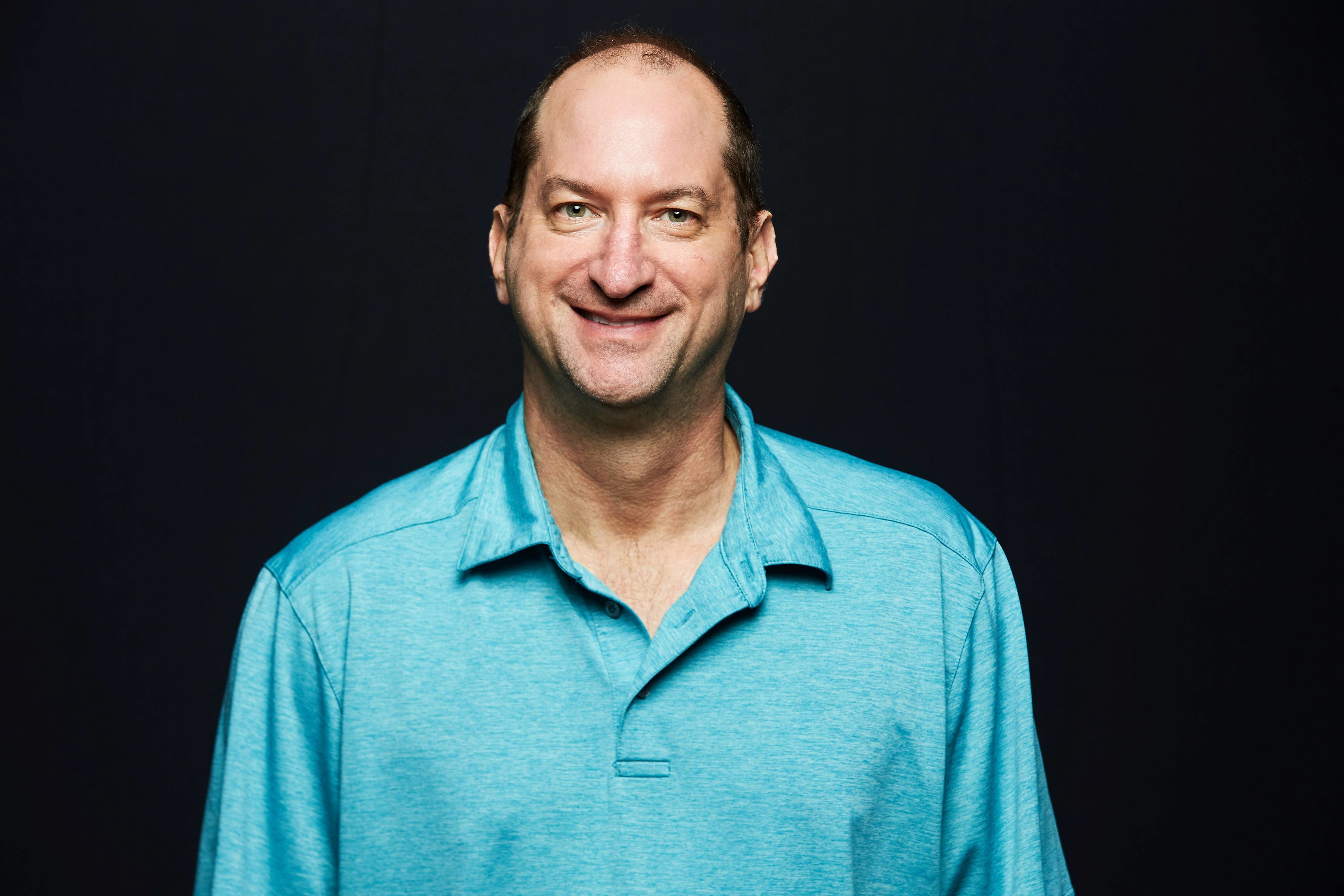 Eric Hymowitz teal shirt
